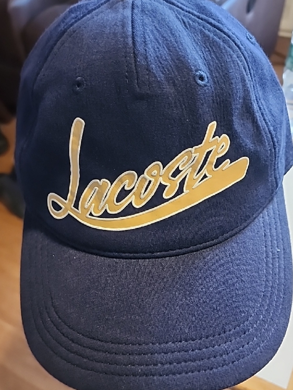 Lacoste Navy Cap with Gold Script Logo